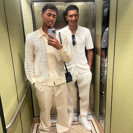 Jobe Bellingham and his big-brother in matching white outfit